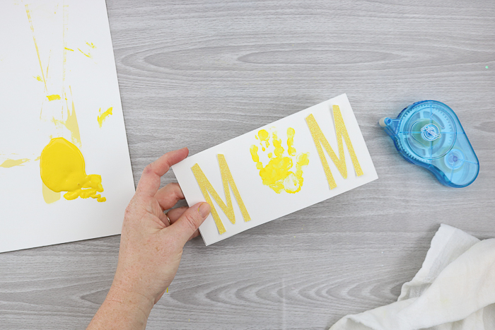 Make your own Mother's Day card with a handprint.