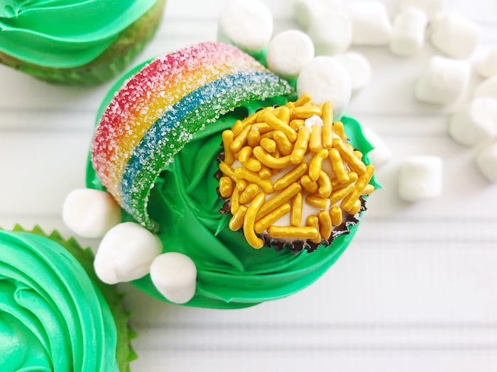 green cupcake with rainbow