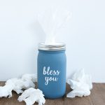 This tissue holder mason jar is an easy craft project that anyone can make for their home with a few supplies! Add art to the front with your Cricut machine if you would like!