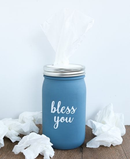 This tissue holder mason jar is an easy craft project that anyone can make for their home with a few supplies! Add art to the front with your Cricut machine if you would like!