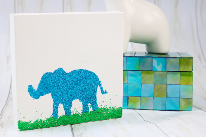 The best glue for glitter is Mod Podge Ultra. Here we are using it to create some glitter art with an elephant!