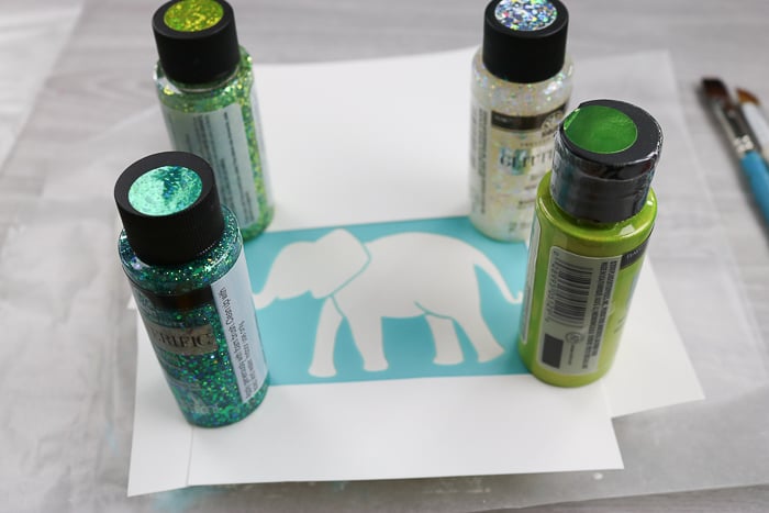 Use glitter to great this fun glitter art made with mod podge ultra.