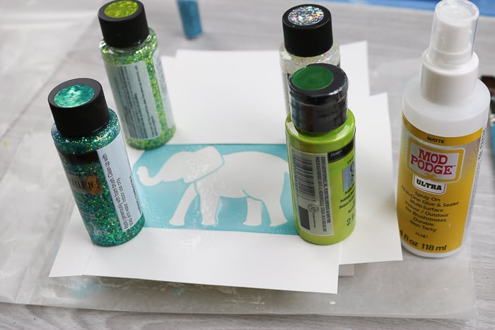 Mod podge Ultra is the best glue for glitter crafts like this glitter wall art. 