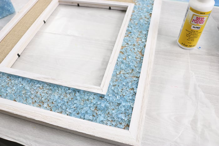 Adhering glass chips to a frame with Mod Podge Ultra