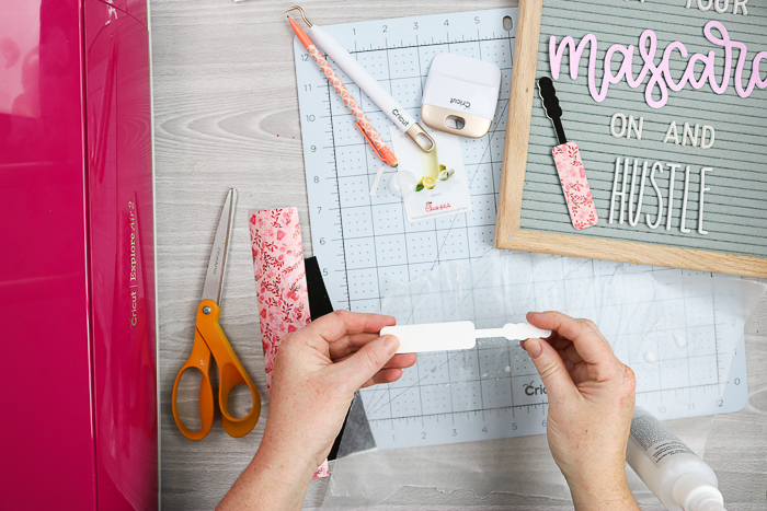 Putting kraft board pieces together to make DIY felt letter board accessories