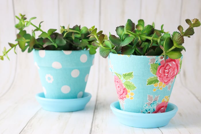 Create these easy fabric covered planter pots with Mod Podge