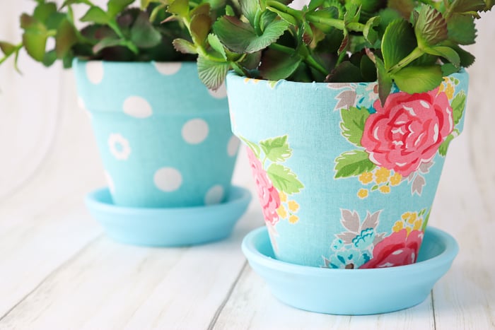 Here's how to decorate terracotta planters with fabric and Mod Podge