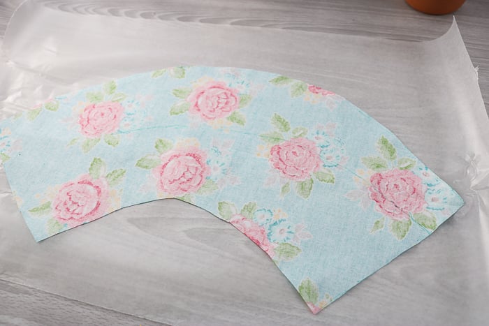 Cut out the fabric to wrap the terracotta planter