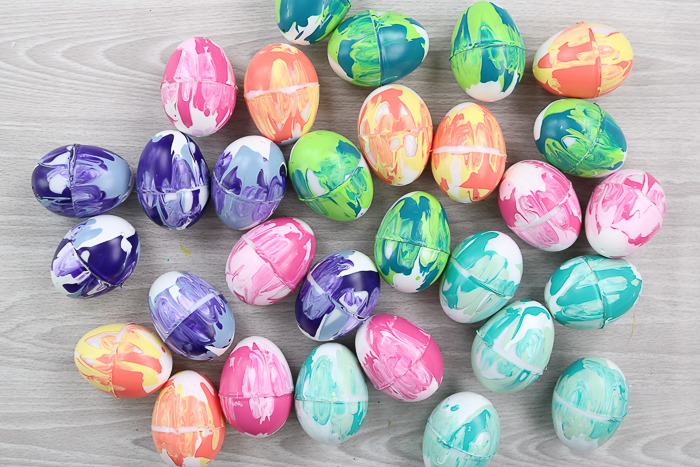 Marbled paint Easter eggs in various colors ready to add to a wreath.