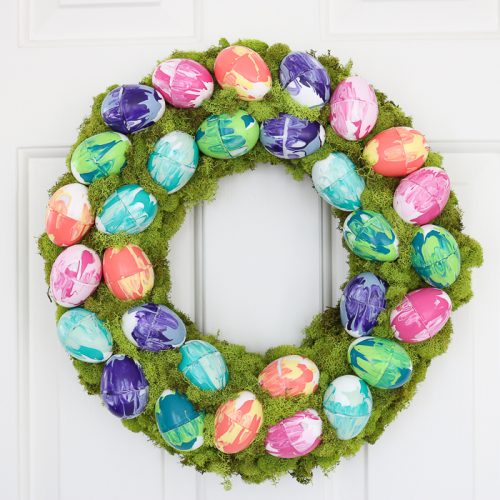 Easter wreath with moss and marbled eggs.