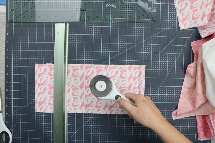 The Cricut rotary blade and cutting ruler.
