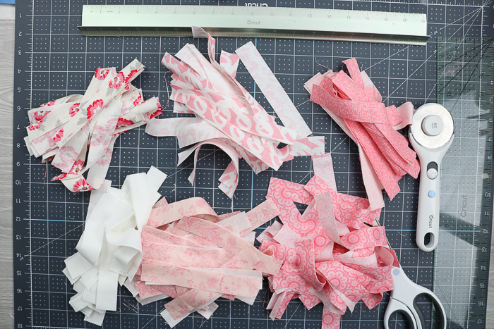 Fabric strips for making a wreath.