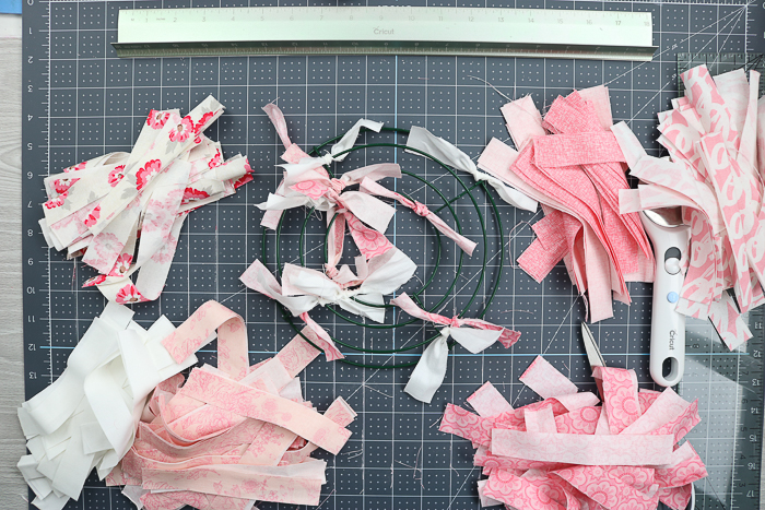 How to tie on fabric strips to a wire wreath form.
