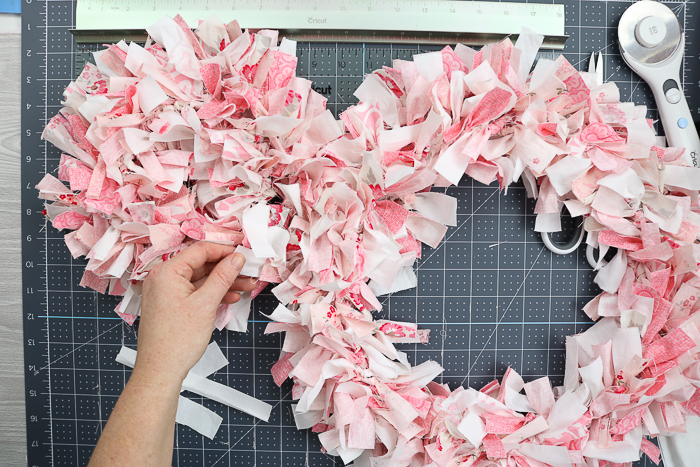 Tie two rag wreaths together to make an Easter bunny wreath.