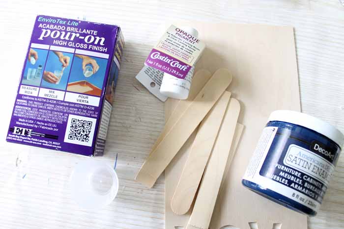 Supplies to make DIY wood coasters with the Cricut Maker and 2 part resin