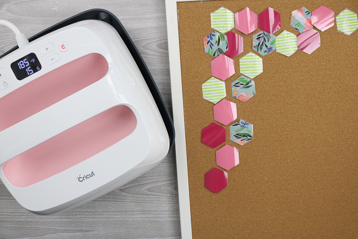 Heat transfer vinyl hexagons added to a cord board