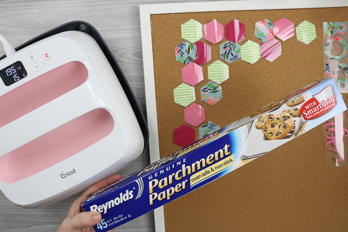 Parchment paper used to cover iron-on when adding to a DIY cork board