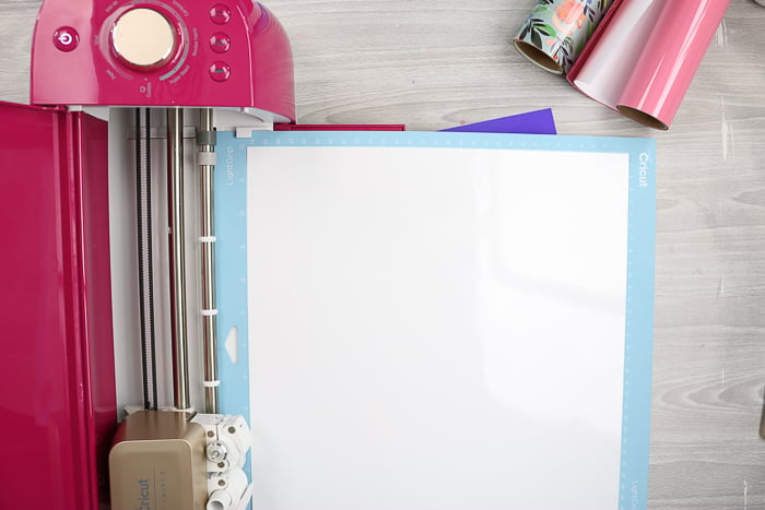 Cutting vinyl with a Cricut machine to make a DIY framed cork board