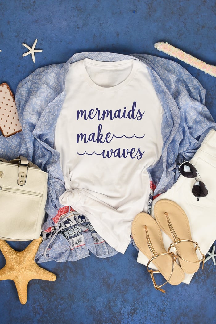 Free mermaid SVG file mermaids make waves on a beach shirt.