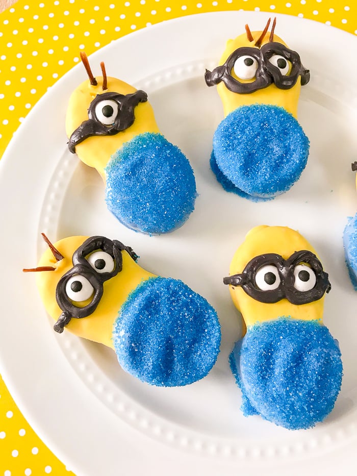 Cute minion cookies decorated on a white plate