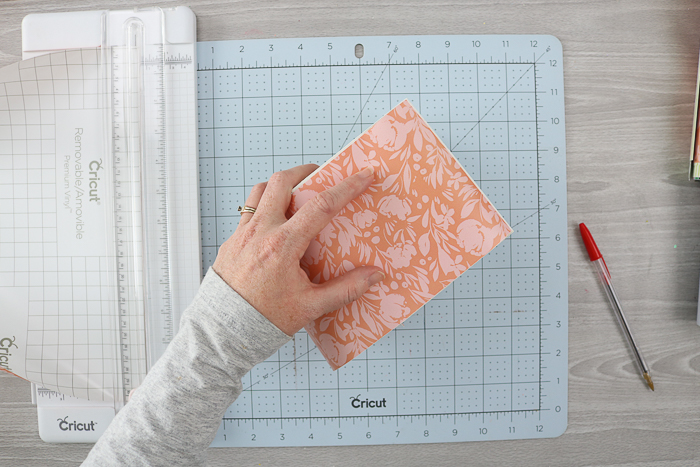 Wrap the wood craft organizer boxes in floral vinyl.