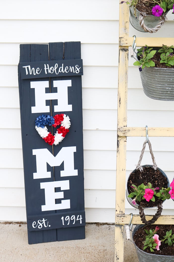patriotic red, white, and blue wreath as the O on DIY home wreath sign