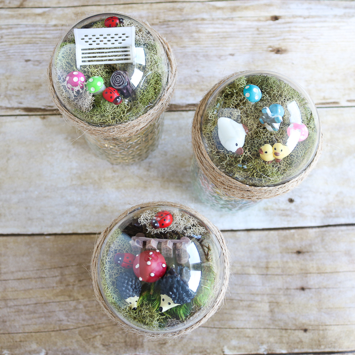 a miniature fairy garden on top of a mason jar