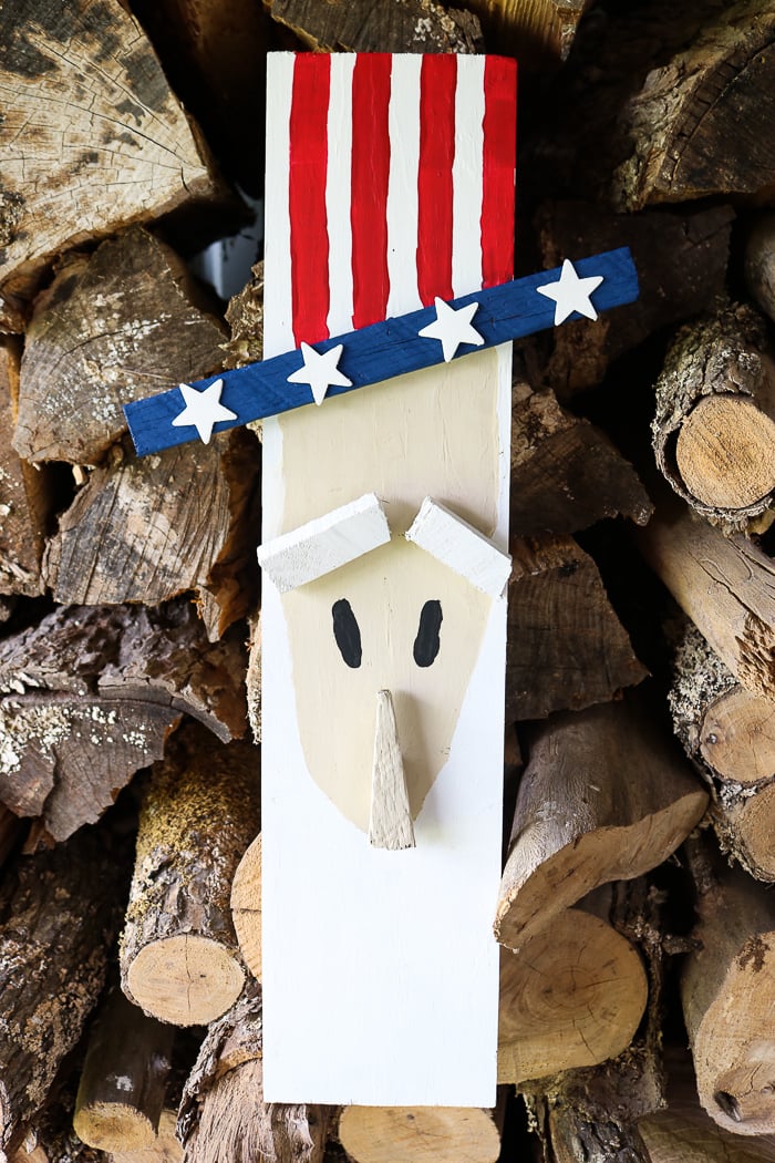 Make Uncle Sam decorations with some scrap wood and these easy to follow instructions. A quick and easy craft for your summer patriotic decor! #summer #patriotic #scrapwood #unclesam