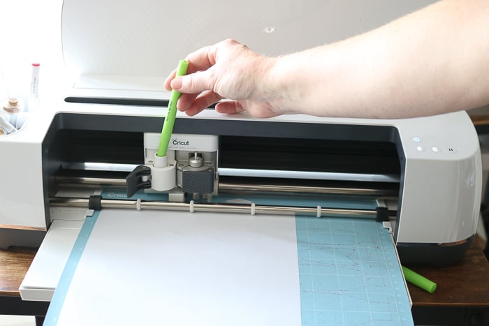 inserting pen into Cricut machine