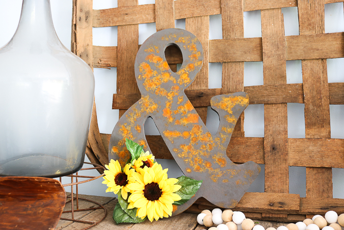 I added a few sunflowers to complete the look on this rustic ampersand decoration
