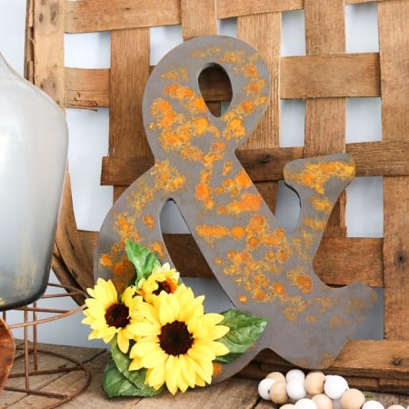 rustic wood ampersand with faux rust finish