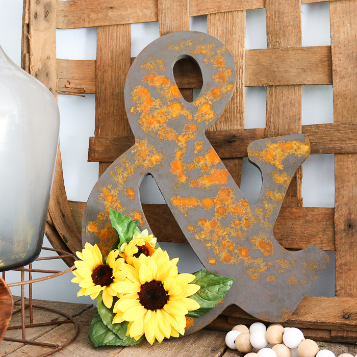 rustic wood ampersand with faux rust finish looks genuinely vintage.