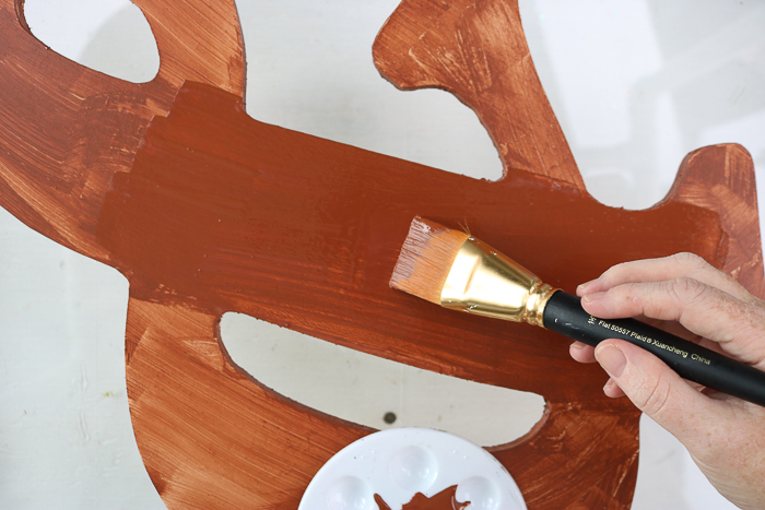 applying second coat of metal effects primer to the ampersand.