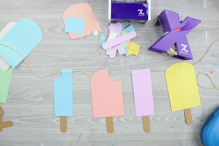 paper popsicles on a string