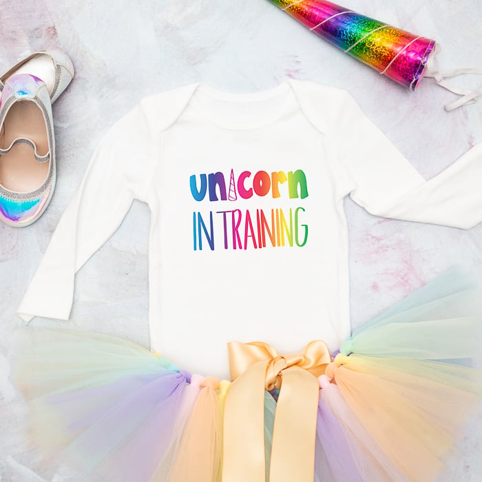 This Unicorn in Training shirt is perfect for little babies and toddlers and made with a Cricut machine.