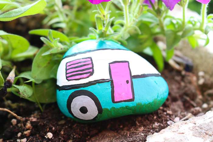 I love this camper painted rock, it fits in perfectly in my garden!