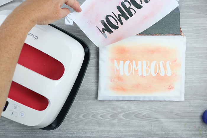 momboss watercolor design with infusible ink pressed onto a makeup bag