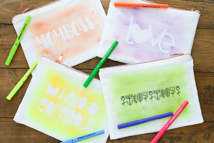 Make these adorable watercolor DIY makeup bags using this simple Cricut tutorial!