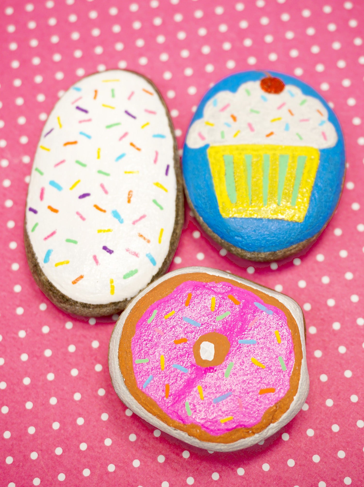 cookie, cupcake, and donut painted rock