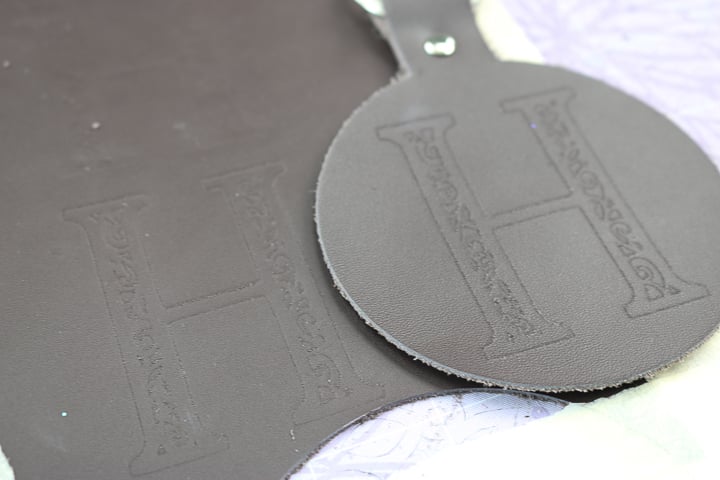 comparison of engraving cuts on pieces of leather