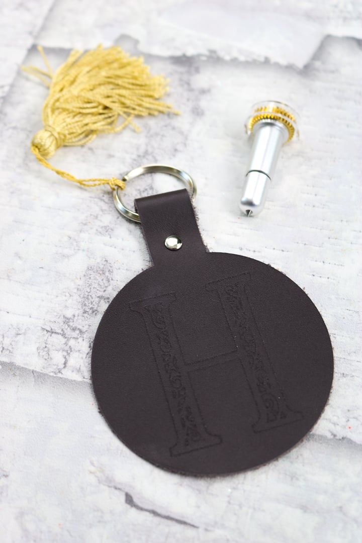 monogrammed keychain with gold tassle