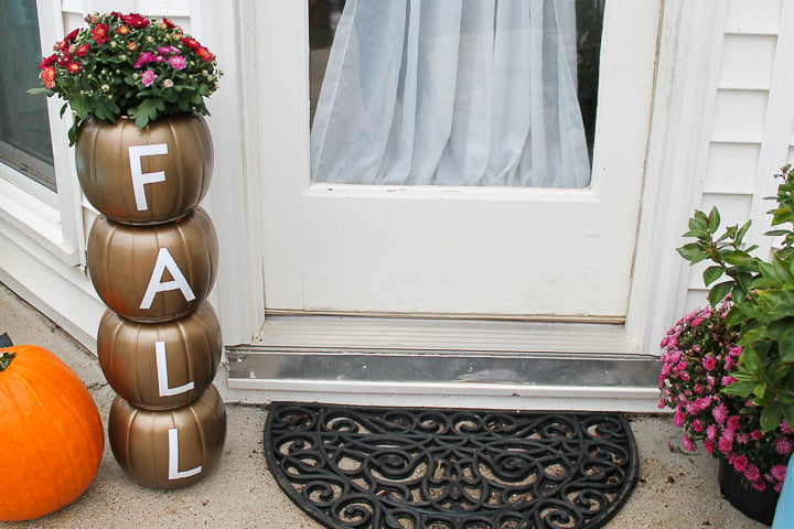 a stacked pumpkin planter for fall