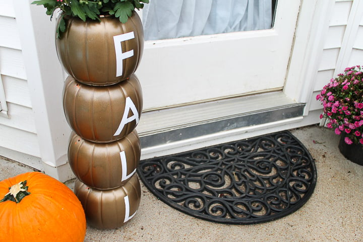 DIY fall planter with plastic pumpkins