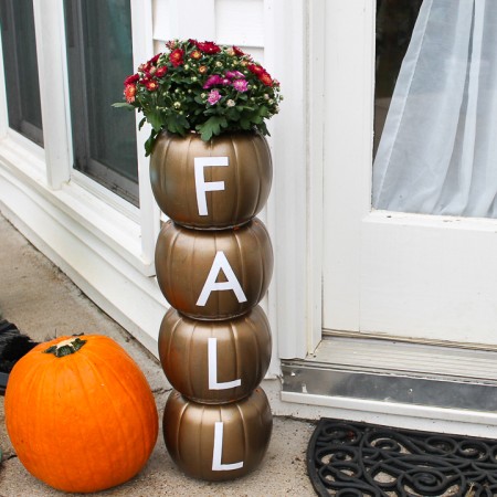 plastic pumpkin planter with a Cricut for fall