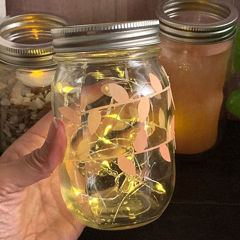 fall leaves on a mason jar