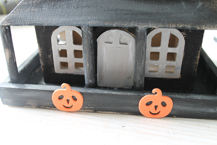 adding foam stickers to haunted house