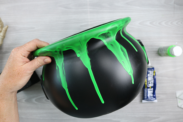 glow in the dark paint on a witch's pail