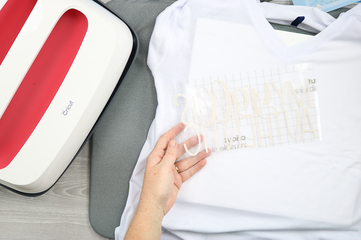 Apply the infusible ink sheet to the clean and prepped t-shirt.