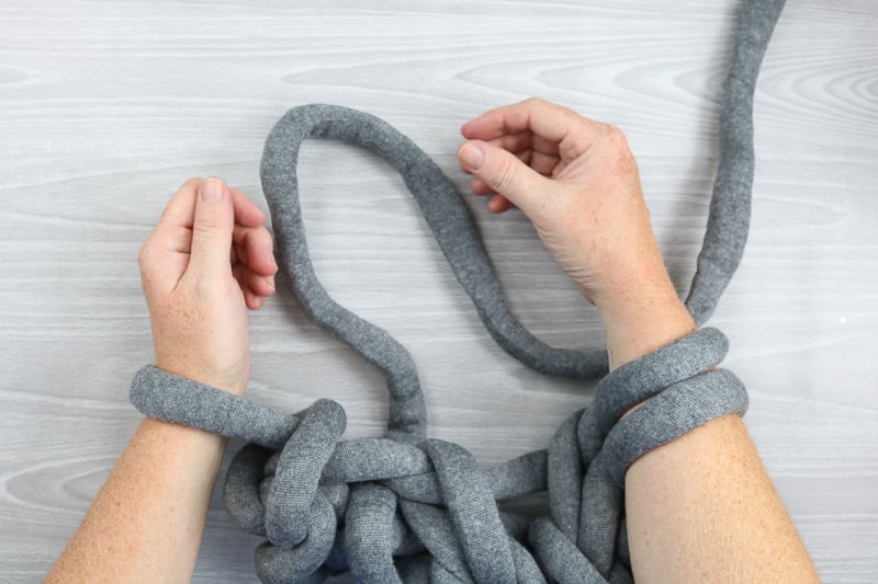 yarn on two wrists
