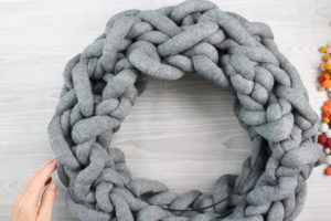 adding wreath form to arm knitting craft